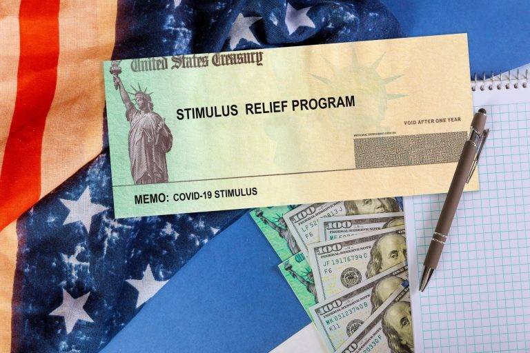 Stimulus financial bill individual checks from government US 100 dollar bills currency Global