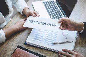 Businessman sending a resignation letter to employer boss in order to dismiss employment contract